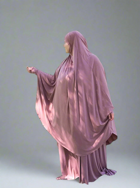 Prayer Set in Rosewood pink color featuring below knee top khimar with sleeves and a custom made elastic waist skirt. Maida's Hijab World 