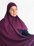 Deep plum-colored instant jersey hijab named Plum Wine, made with slightly thicker buttery soft fabric, paired with matching undercap on neutral background.