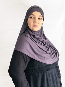 Lightweight charcoal gray double loop hijab with an attached undercap, showcasing its smooth texture and soft drape in natural light.
