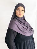 Lightweight charcoal gray double loop hijab with an attached undercap, showcasing its smooth texture and soft drape in natural light.