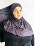 Charcoal gray instant jersey hijab shawl with a fluid drape and matching undercap, styled on a neutral background.
