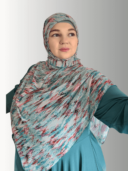 Woman wearing. Hijab in multi color print 