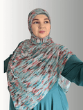Woman wearing. Hijab in multi color print 