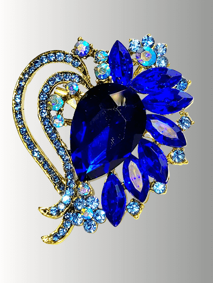 Blue sapphire crystal hijab brooch with gold floral detailing.