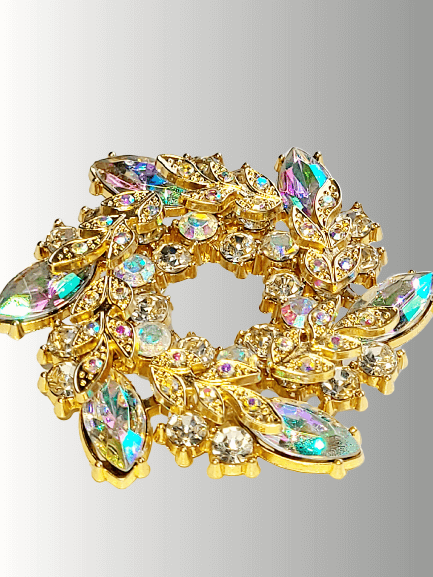Iridescent floral hijab brooch, colorful rhinestone hijab pin, sparkling hijab accessories.