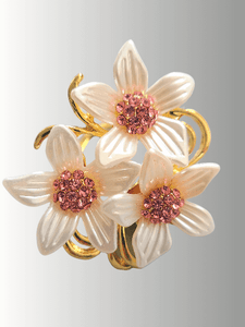 Gold floral hijab brooch with ivory petals and pink crystal centers, featuring both a pin and lapel clip option